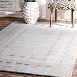 NuLOOM Handmade Border Zamora Area Rug