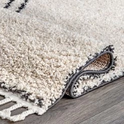 NuLOOM Kiara Infinity Emblem Tassel