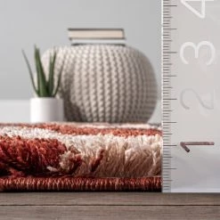 NuLOOM New Arrivals Braelyn Abstract Trellis Shag With Tassel Area Rug