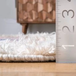 NuLOOM New Arrivals Riker Shaggy Framed Aztec