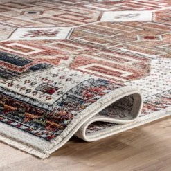 NuLOOM Evie Global Inspired Emblem Fringe Area Rug