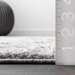 NuLOOM New Arrivals Sully Soft Snowflake Textured Tassel Area Rug