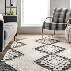 NuLOOM Kylee Soft Shaggy Textured Tassel Area Rug