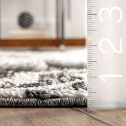 NuLOOM New Arrivals Mikayla High Low Soft Shaggy Tribal Tassel Area Rug